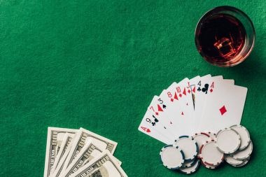 Live dealer handling cards at Speed Baccarat table